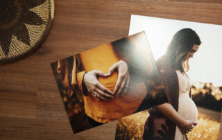 Two prints of pregnant woman on lustre photo paper