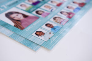 Corner of laminated composite school photos with colourful design