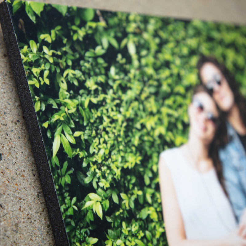 photo mounted by photo lab onto black foam board