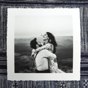 Textured canson aquarelle rag black and white print of bride and groom with a white border and torn edge