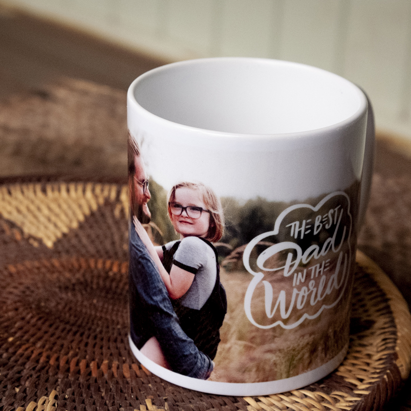 Image of young girl and her dad printed onto a coffee mug that says the best dad in the world