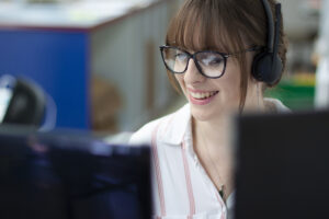 Young woman on phone smiling