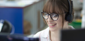 Young woman on phone smiling